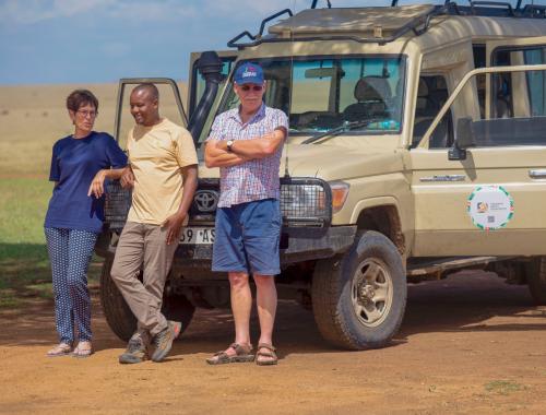 Tanzania Safari Specialist Guide with Travellers at Serengeti National Park