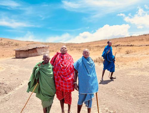 Tanzania Safari Specialist Guide with Travellers at Serengeti National Park