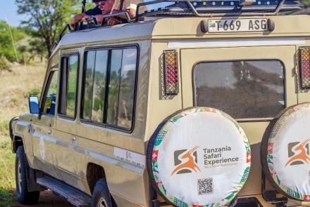 Tanzania Safari Specialist Guide with Travellers at Serengeti National Park